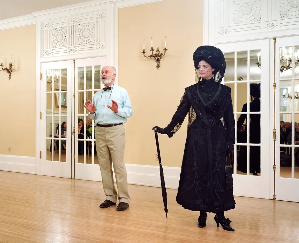 Jeff Wall, Ivan Sayers, costume historian, lectures at the University Women’s Club, Vancouver, 7 Dec. 2009. Virginia Newton-Moss wears a British ensemble c. 1910, from Sayers’ collection.