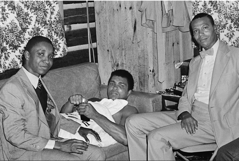Kwame Brathwaite, Untitled (Ali with Minister Louis Farrakhan and a Guinean delegate of President Sekou Touré during the training for the Rumble in the Jungle)